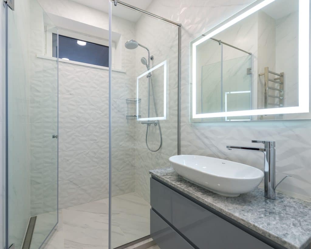 Douche à l’italienne et meuble suspendu pour rénovation salle de bain Paris 14